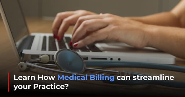 Person typing on laptop with stethoscope.